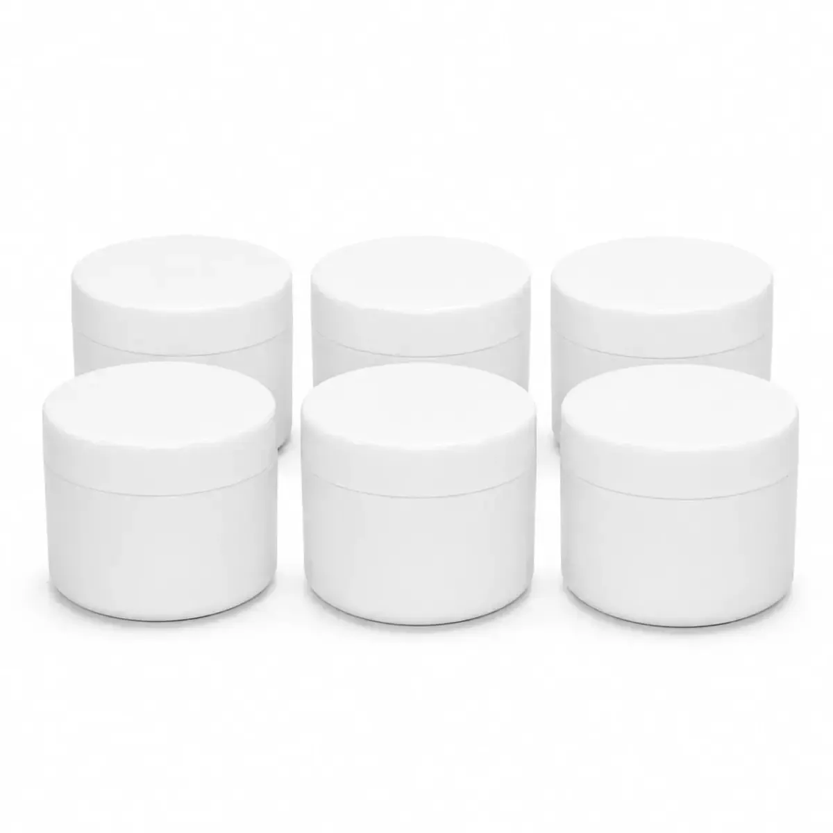 Six white cosmetic jars arranged in two rows